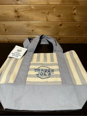 Authentic BNWT viral Trader Joe’s 2026 striped mini canvas summer tote in blue.